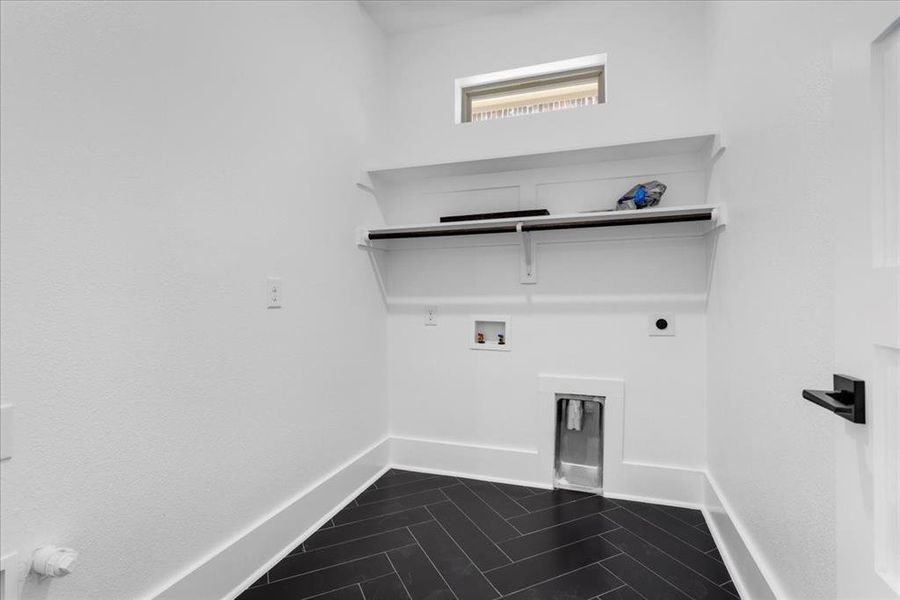 Laundry area featuring hookup for a washing machine, hookup for an electric dryer, and gas dryer hookup