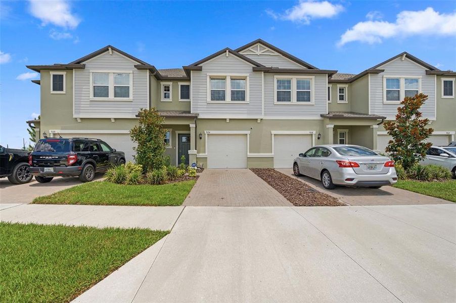 Front exterior of a new home in , Land O' Lakes, FL, highlighting curb appeal (Image 1). Front exterior of a new home in , Land O' Lakes, FL, highlighting curb appeal (Image 1).