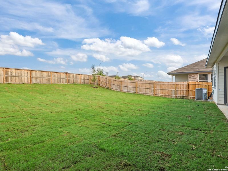 Exterior details and patio area of a home in Comanche Ridge, San Antonio (Image 21).