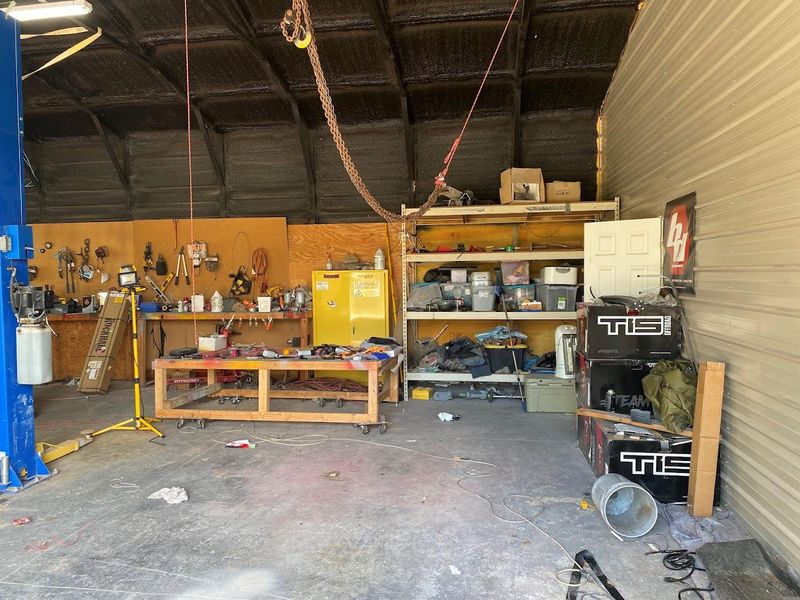 Garage featuring a workshop area