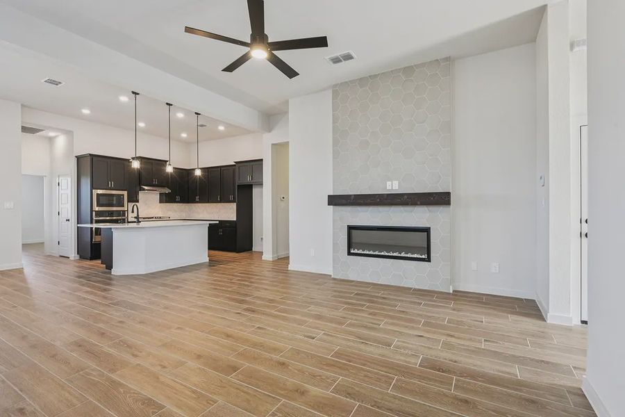 Representative unfurnished interior of a home built from the Rhyan by Chesmar Homes in Stream Waters, Seguin (Image 13).