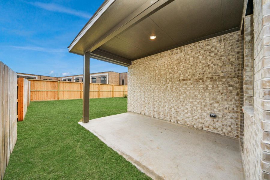 Exterior details and patio area of a home in Elyson, Katy (Image 3).