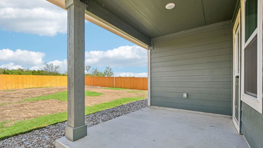 Exterior details and patio area of a home in Trails at Wildhorse, Austin (Image 4).
