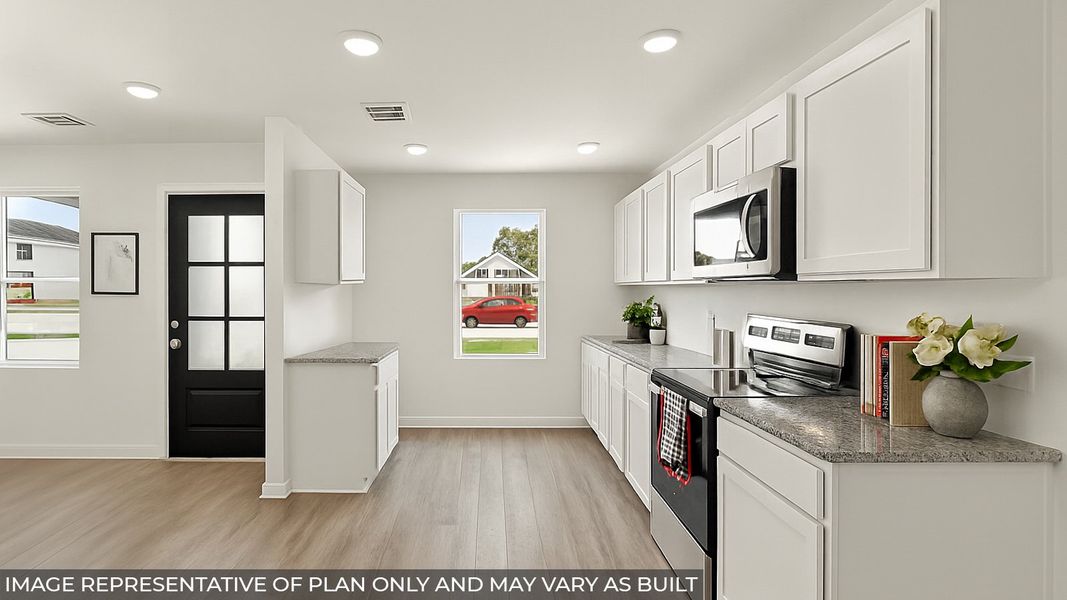 Representative furnished interior of a home built from the Blake by D.R. Horton in Castles Edge, Willis (Image 8).