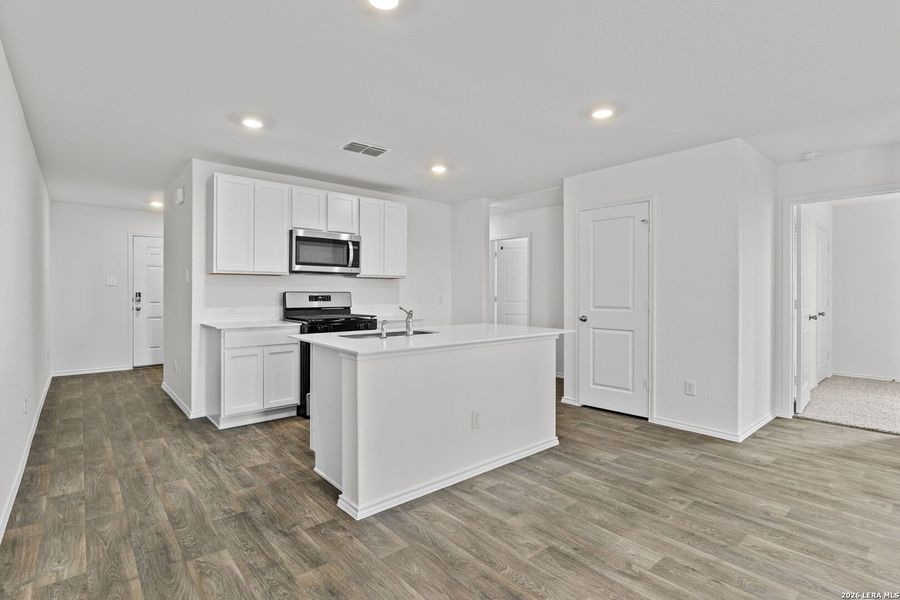 Furnished interior view inside a new home in Avenida, Converse (Image 7).