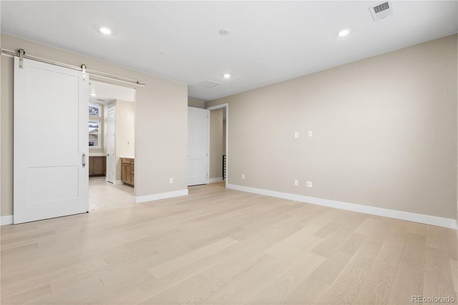 Spacious, unfurnished interior of a new home in Autograph at Lyric, Lone Tree (Image 48).
