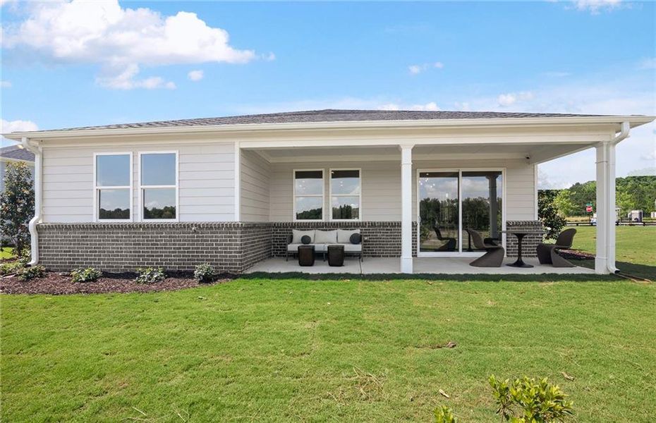 Exterior details and patio area of a home in Overland, Locust Grove (Image 23).
