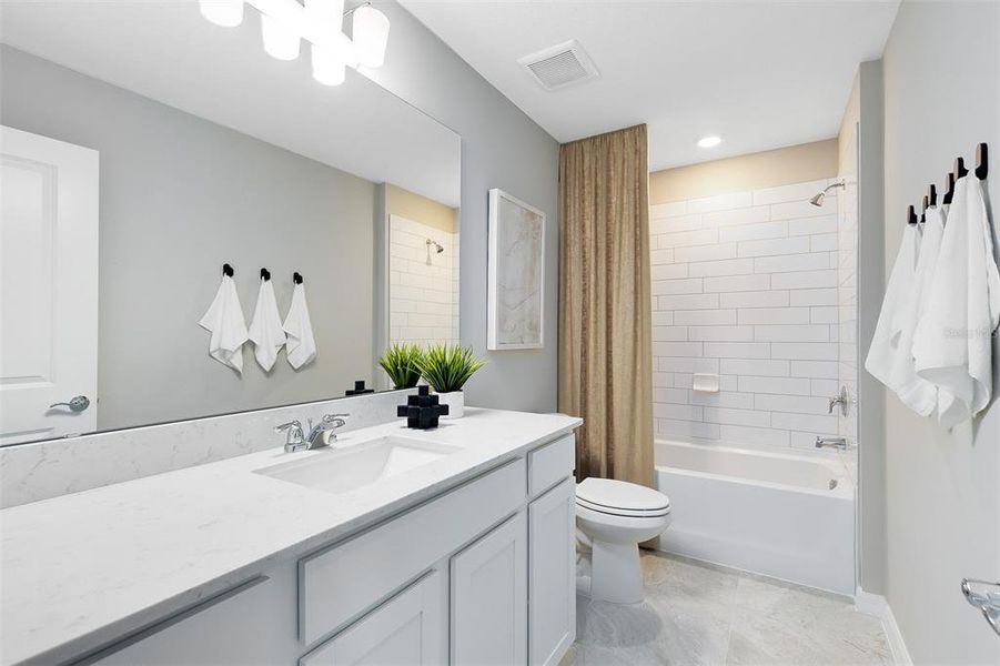 Furnished interior view inside a new home in Parkside Trails, Clermont (Image 7).