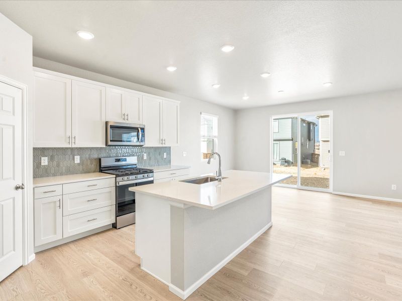 The Snowberry floorplan interior image taken at a Meritage Homes community in Brighton, CO.