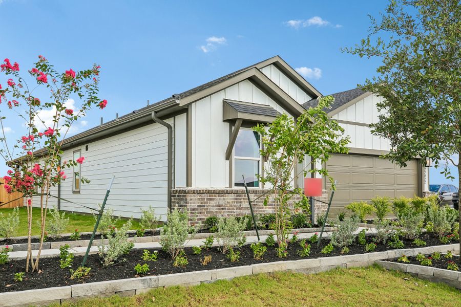 Representative exterior photo of a completed home built from the Charlton by Taylor Morrison in Mason Woods, Cypress, TX (Image 24).