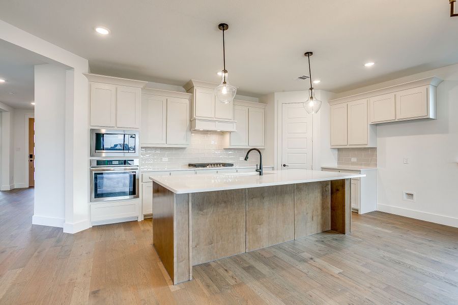 Representative furnished interior of a home built from the Valera by Graham Hart Home Builder in Bear Ridge, Burleson (Image 15).