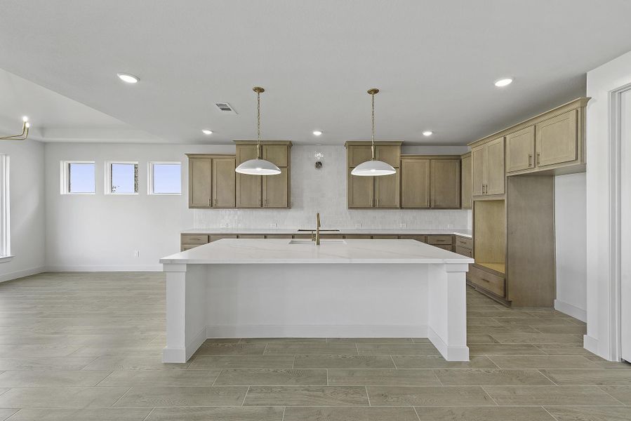 Furnished interior view inside a new home in Bridgeland, Cypress (Image 7).