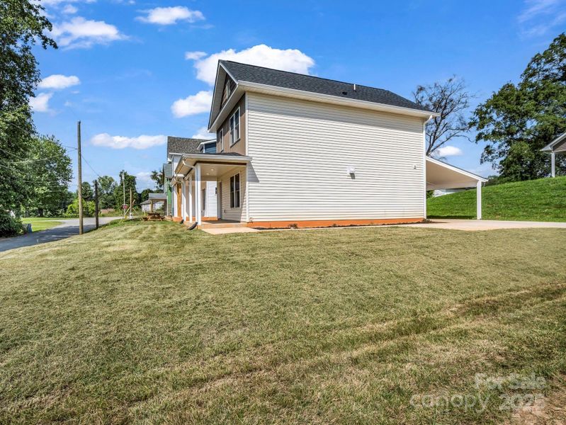 Front exterior of a new home in , Spindale, NC, highlighting curb appeal (Image 18).