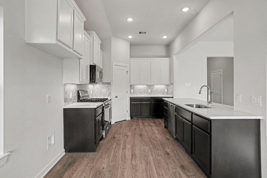Furnished interior view inside a new home in Clear View Estates, Willis (Image 5).