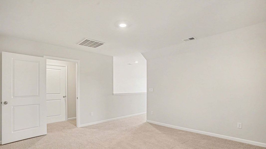 Representative unfurnished interior of a home built from the Bristol by D.R. Horton in Fox Run, Supply (Image 15).