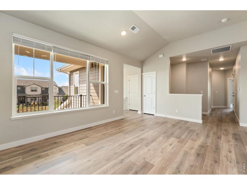 Spacious, unfurnished interior of a new home in The Lakes at Centerra, Loveland (Image 22).