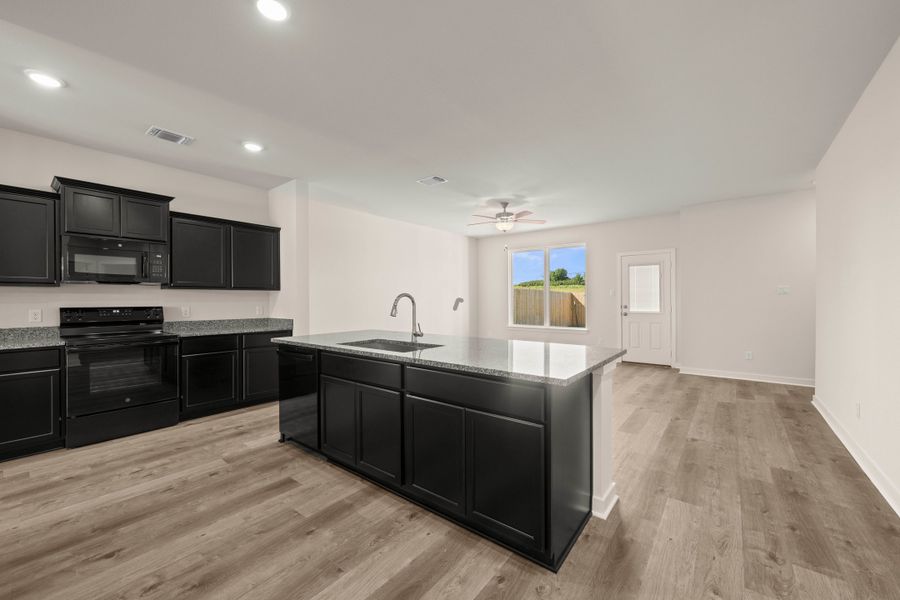 Furnished interior view inside a new home in The Village at Elm Creek, Troy (Image 6).