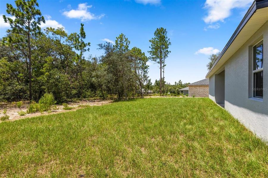 Front exterior of a new home in , Citrus Springs, FL, highlighting curb appeal (Image 17). Front exterior of a new home in , Citrus Springs, FL, highlighting curb appeal (Image 17).