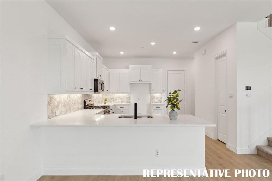 No shortage of style, space or storage in this dream kitchen!  REPRESENTATIVE PHOTO