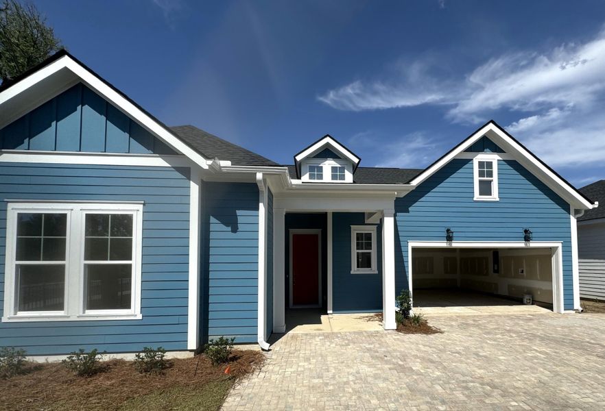 Front exterior of a new home in Nexton – Midtown – The Garden Collection, Summerville, SC, highlighting curb appeal (Image 18).