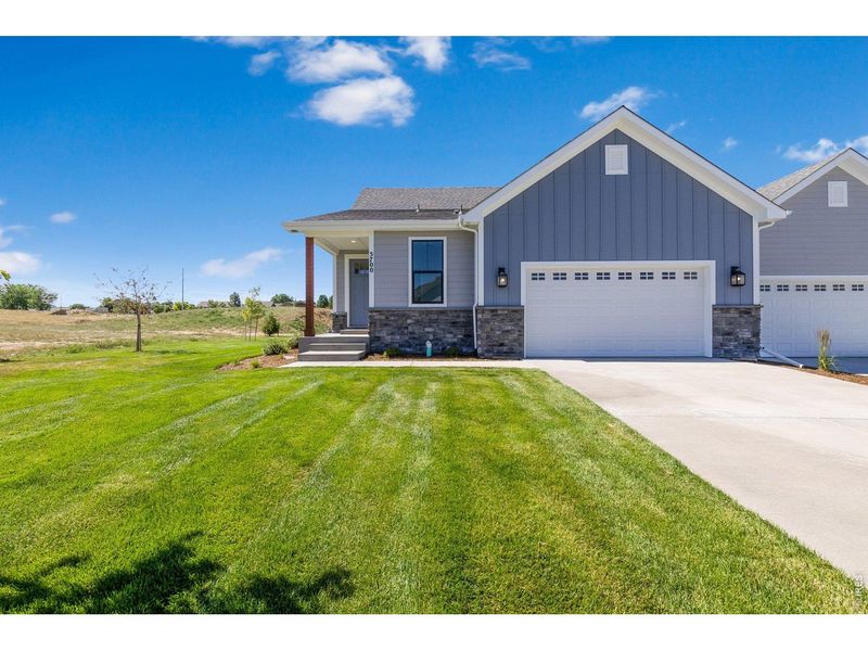 Front exterior of a new home in , Greeley, CO, highlighting curb appeal (Image 2). Front exterior of a new home in , Greeley, CO, highlighting curb appeal (Image 2).