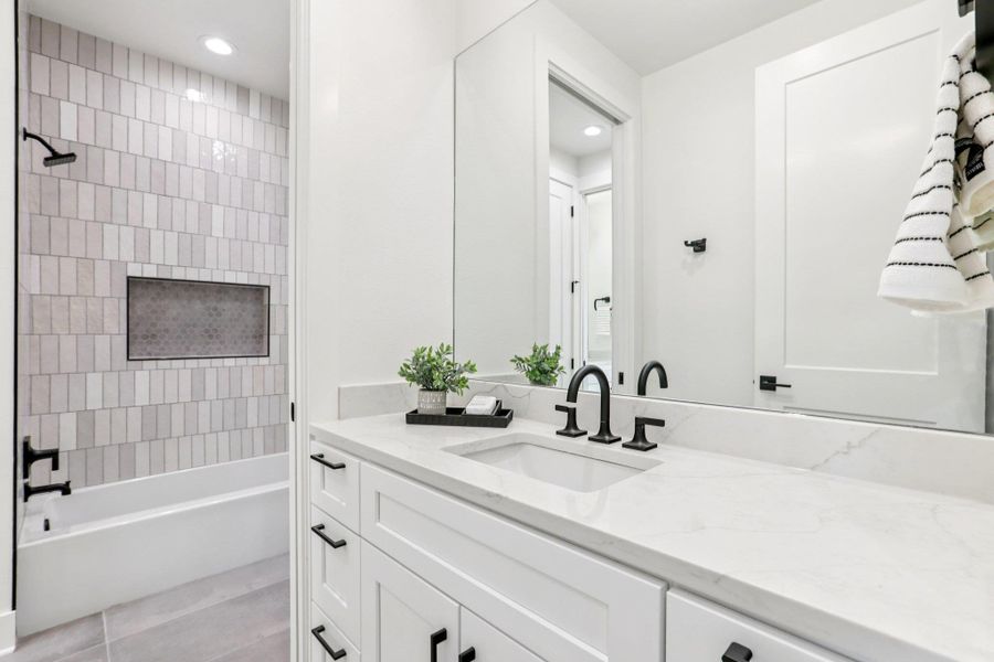 Designed with a modern touch, the bathrooms blend style with daily function.