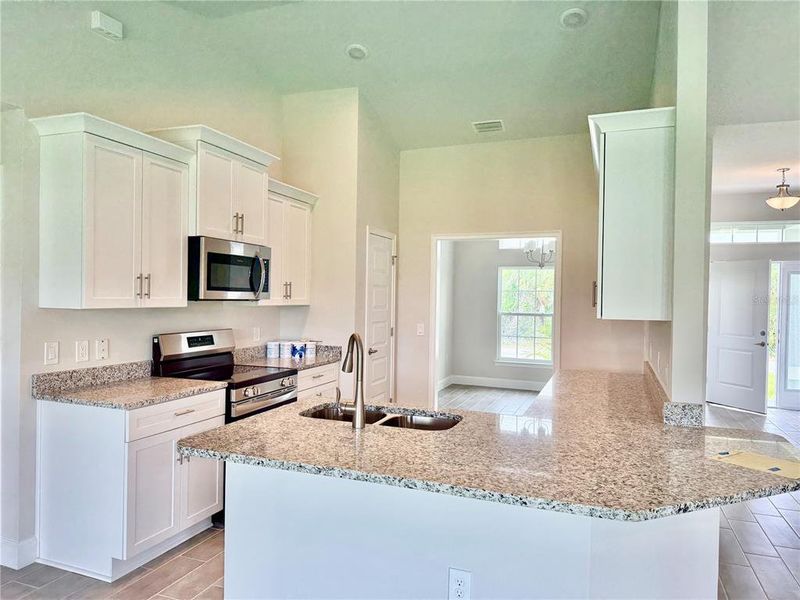 Furnished interior view inside a new home in South Gulf Cove, Port Charlotte (Image 5).