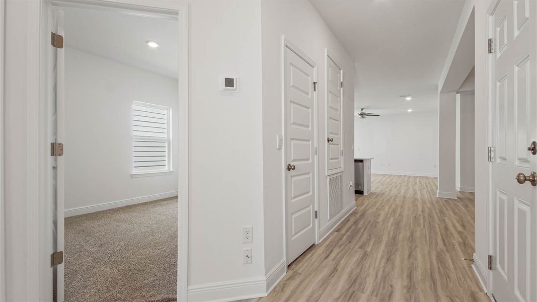 Representative unfurnished interior of a home built from the Kennedy by D.R. Horton in Bayside at Ward Creek, Panama City Beach (Image 19).