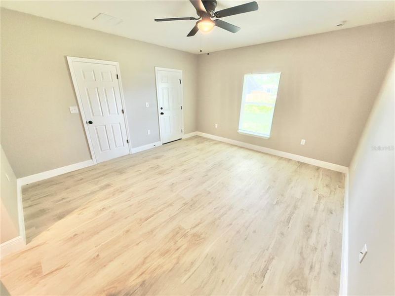 Spacious, unfurnished interior of a new home in , Port Charlotte (Image 22).