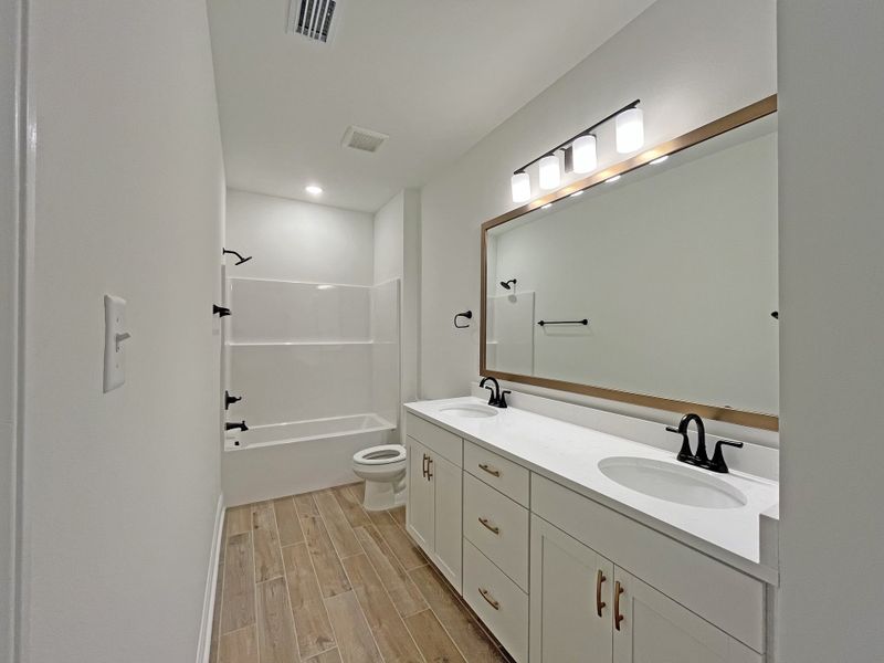 Furnished interior view inside a new home in Bird Song at Hammock Bay, Freeport (Image 13).