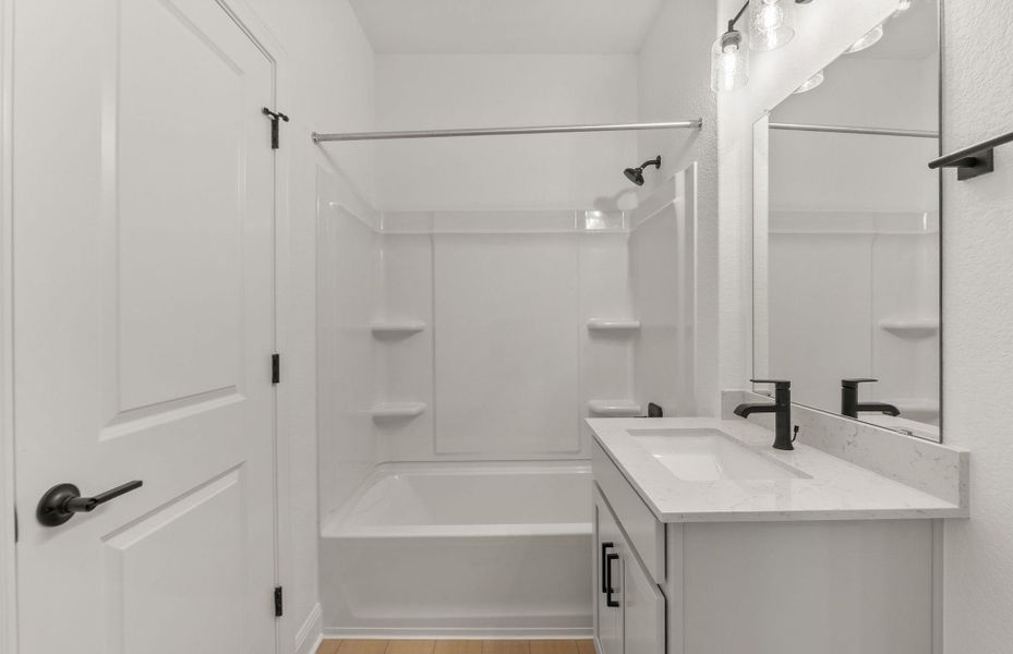 Furnished interior view inside a new home in Horizon Lake, Leander (Image 11).