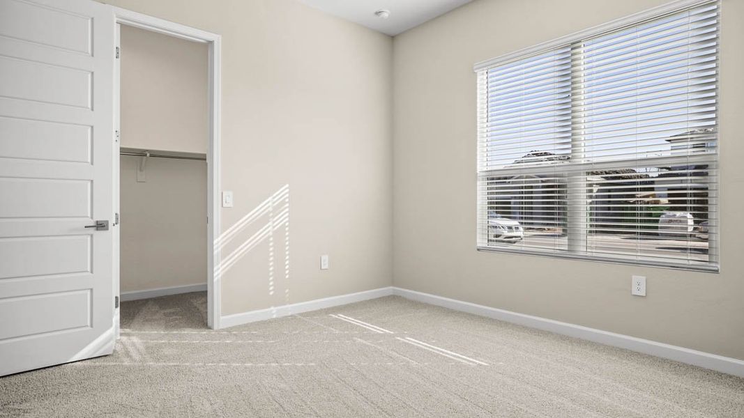 Spacious, unfurnished interior of a new home in Zanjero Pass, Waddell (Image 38).