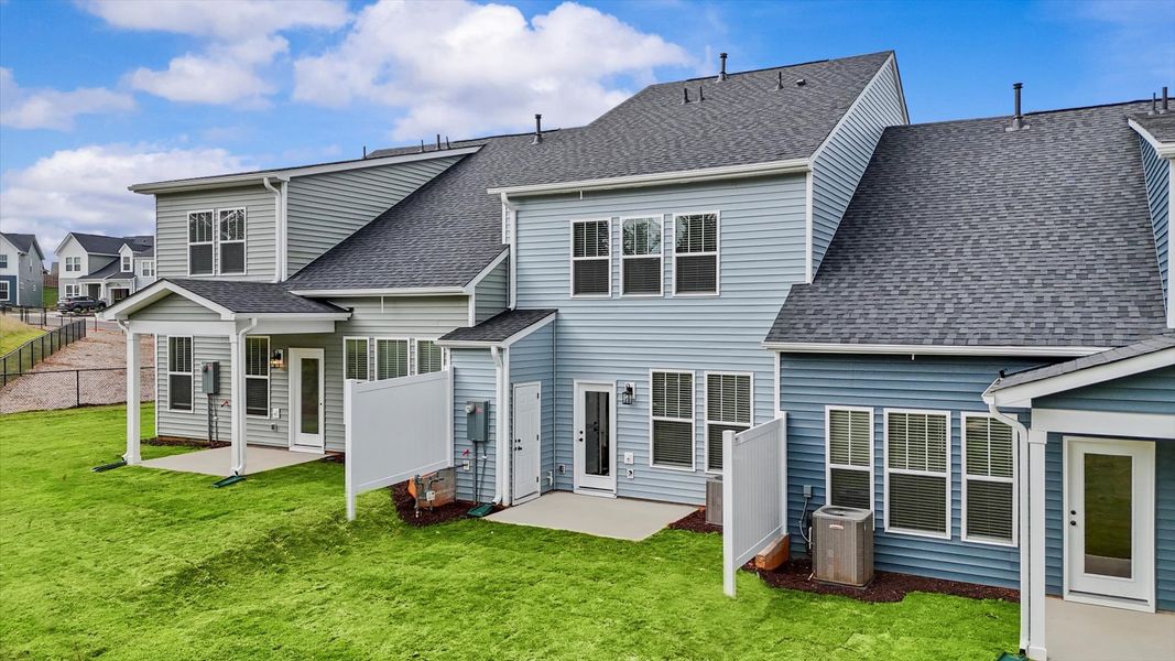 Functional design and eye-catching details in this accomplished townhome at Aspen Ridge