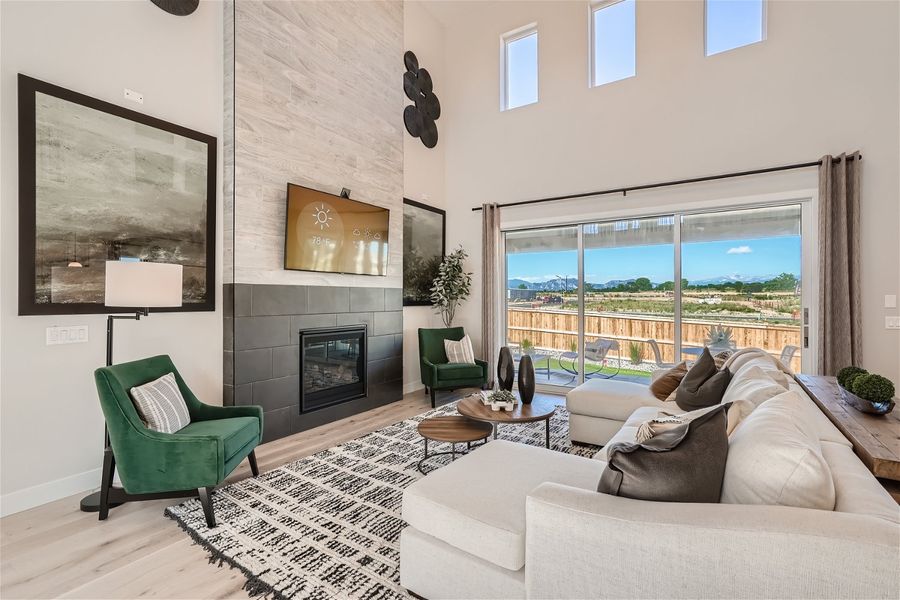 A living room with a fireplace. A living room with a fireplace.