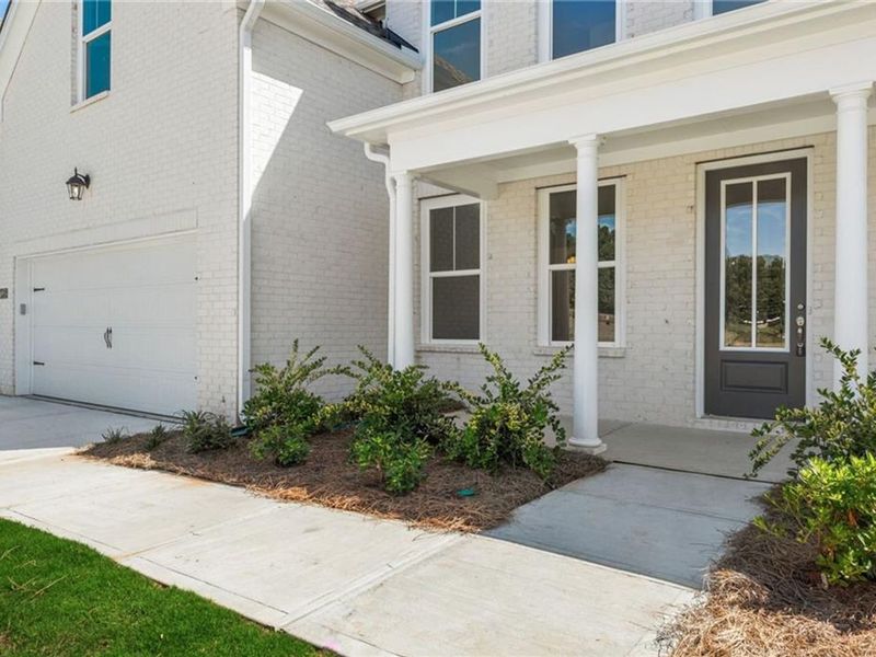 Exterior details and patio area of a home in Melody Lakeside Estates, Buford (Image 2).