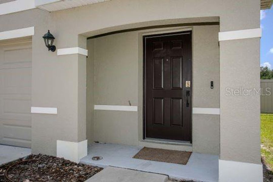 Exterior details and patio area of a home in Evergreen, Bradenton (Image 4). Exterior details and patio area of a home in Evergreen, Bradenton (Image 4).