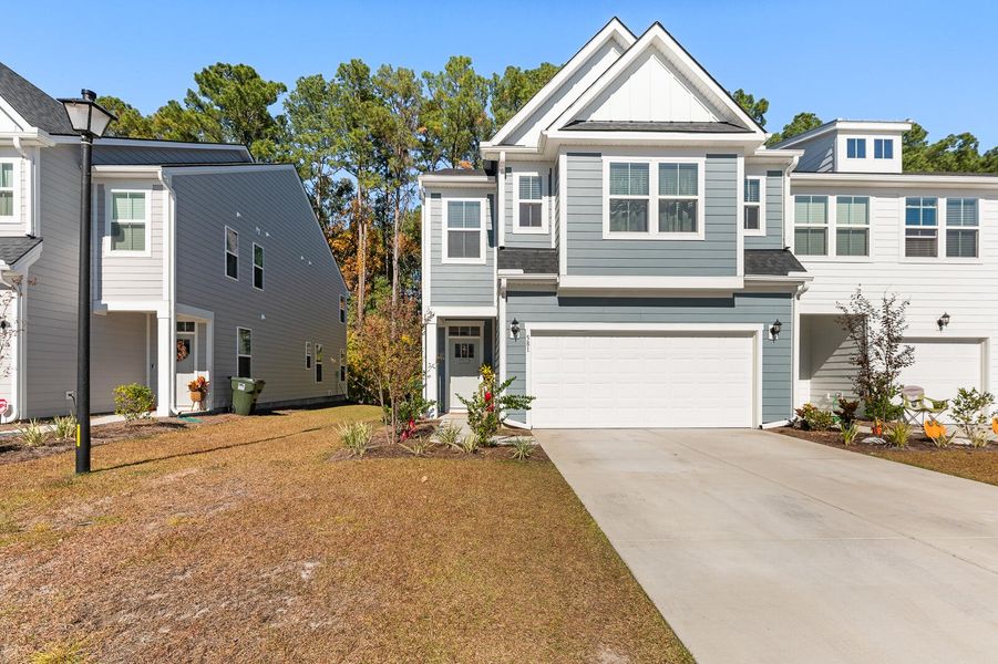 Front exterior of a new home in , Moncks Corner, SC, highlighting curb appeal (Image 1). Front exterior of a new home in , Moncks Corner, SC, highlighting curb appeal (Image 1).
