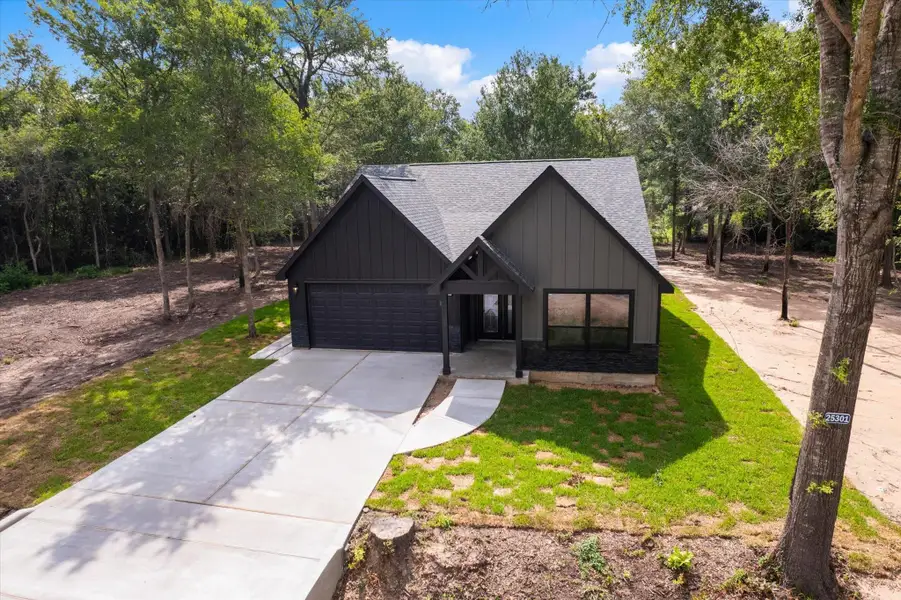 Front exterior of a new home in , Hempstead, TX, highlighting curb appeal (Image 1). Front exterior of a new home in , Hempstead, TX, highlighting curb appeal (Image 1).