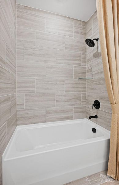 Full Tile Wall at Tub.  Representative Photo.