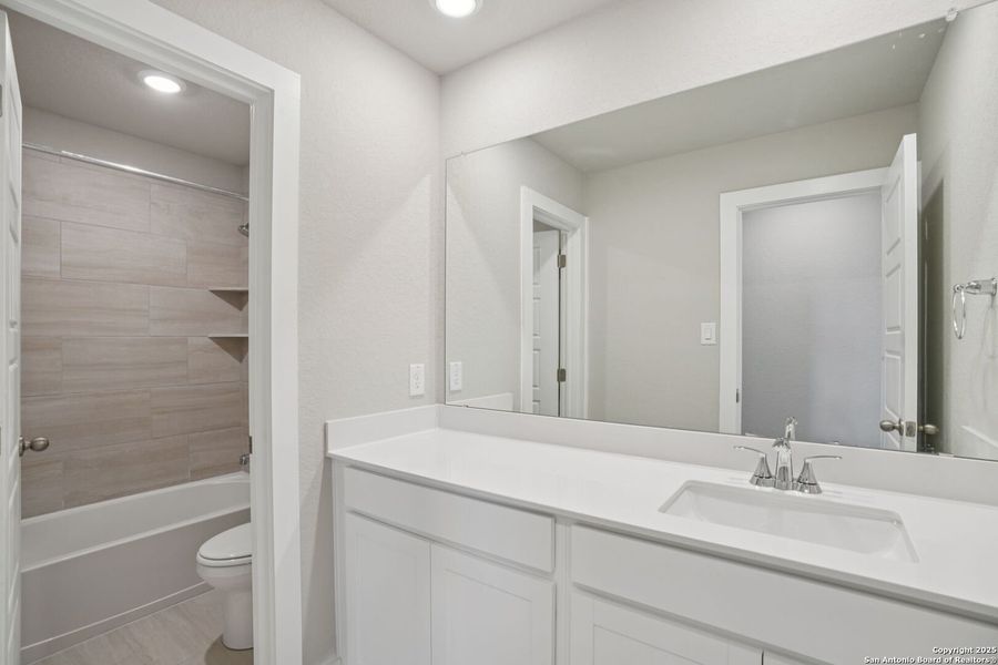 Furnished interior view inside a new home in Kallison Ranch, San Antonio (Image 13).