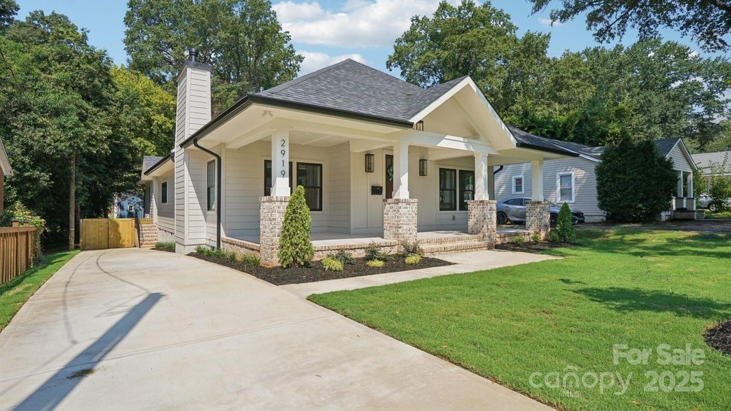 Front exterior of a new home in , Charlotte, NC, highlighting curb appeal (Image 18).