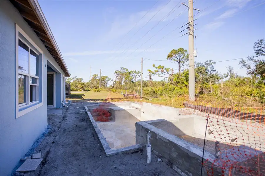 Exterior details and patio area of a home in , Englewood (Image 3).