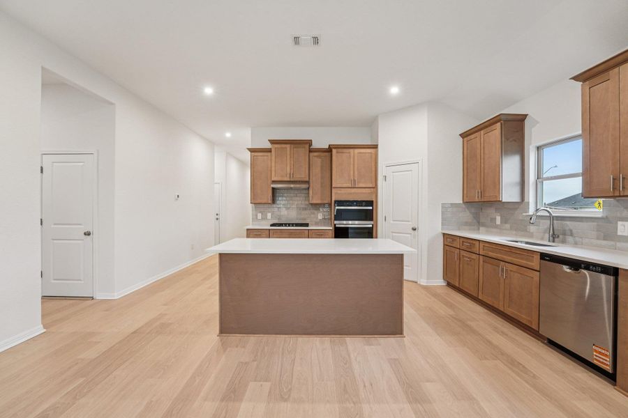 Furnished interior view inside a new home in Crosswinds, Kyle (Image 7).