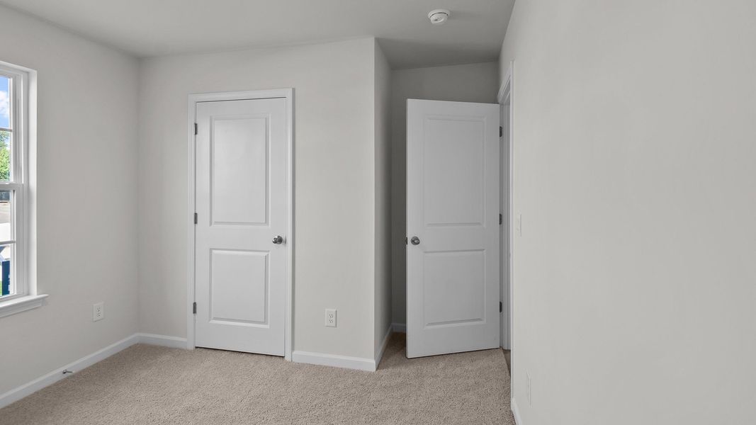 Spacious, unfurnished interior of a new home in Hobbs Farm, Ayden (Image 9). Spacious, unfurnished interior of a new home in Hobbs Farm, Ayden (Image 9).