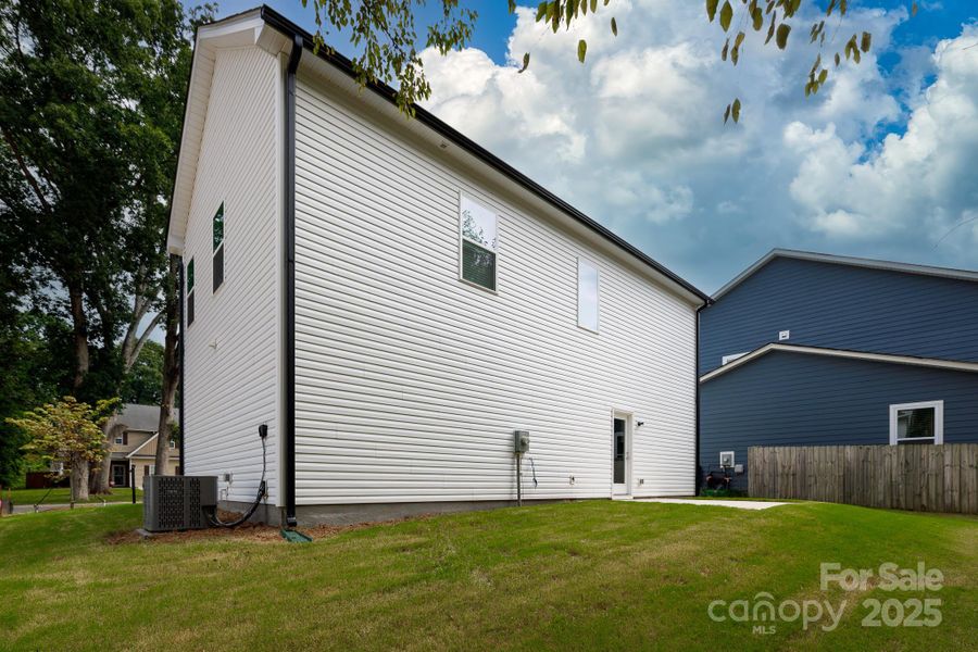 Front exterior of a new home in , Charlotte, NC, highlighting curb appeal (Image 22).