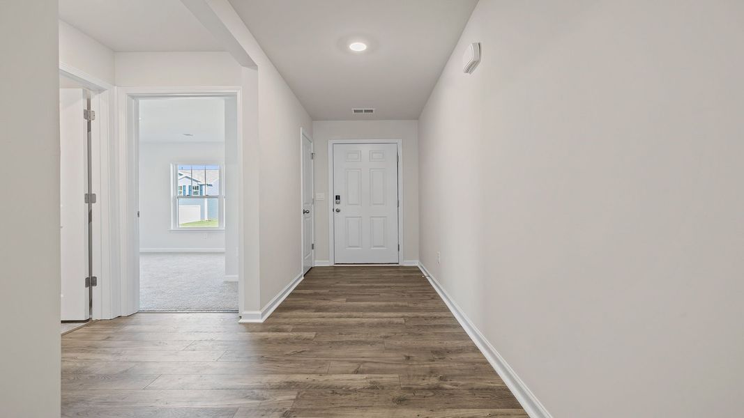 Spacious, unfurnished interior of a new home in Bentley Park, Greenwood (Image 13).