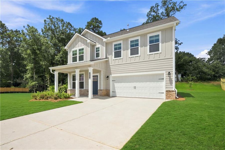 Front exterior of a new home in Cooper Park, McDonough, GA, highlighting curb appeal (Image 16).