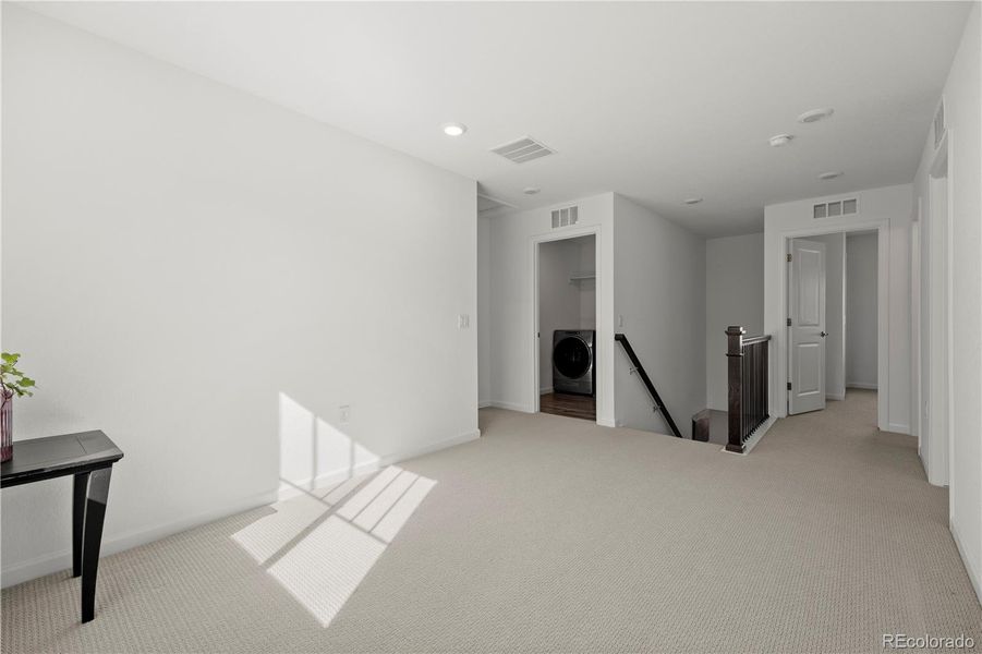 Spacious, unfurnished interior of a new home in Anthology North, Parker (Image 22).