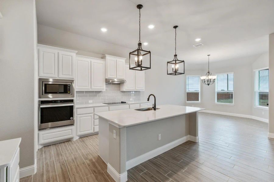 Kitchen | Concept 2373 at Coyote Crossing in Godley, TX by Landsea Homes Kitchen | Concept 2373 at Coyote Crossing in Godley, TX by Landsea Homes