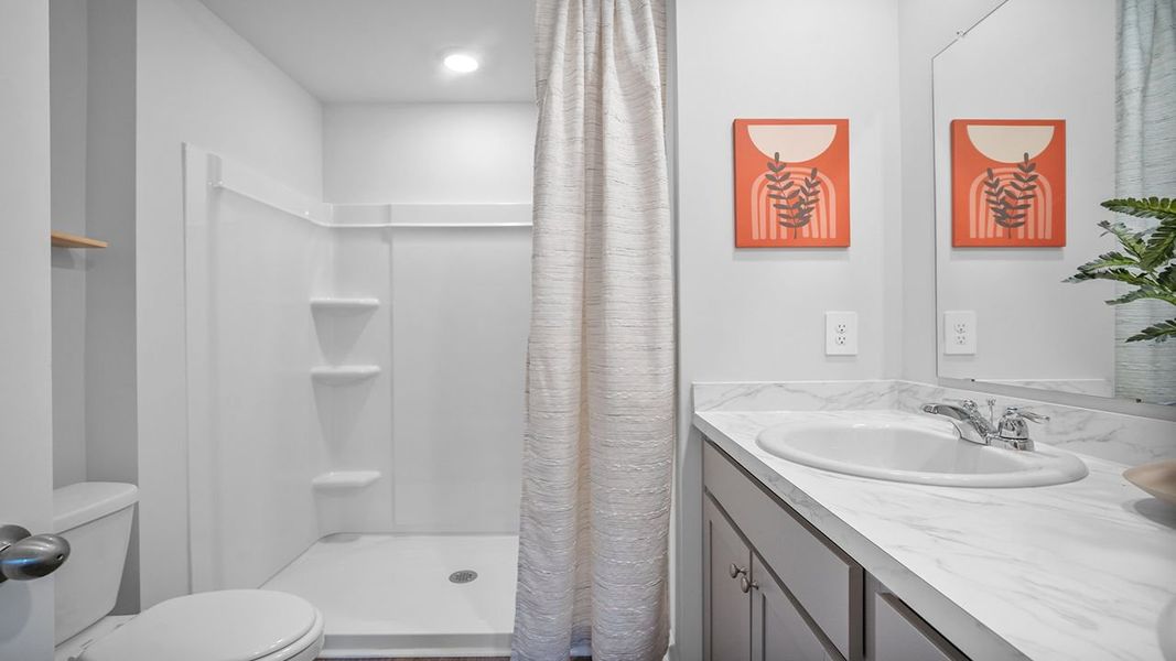 Representative furnished interior of a home built from the Sullivan by D.R. Horton in Rice Hope, Port Wentworth (Image 17).